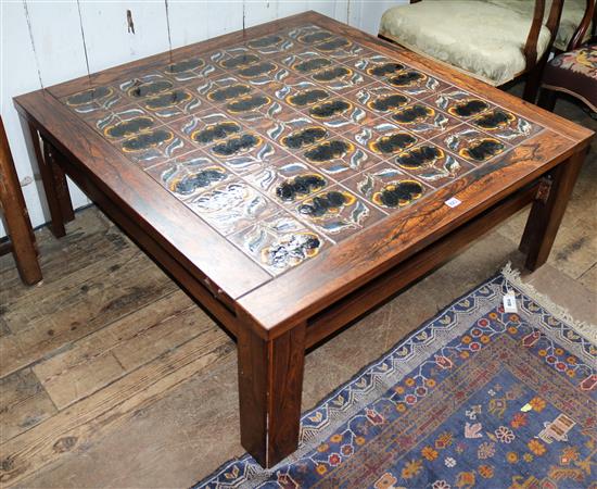 A 1950s Danish rosewood coffee table, W.3ft 9in. D.3ft 9in. H.1ft 5in.